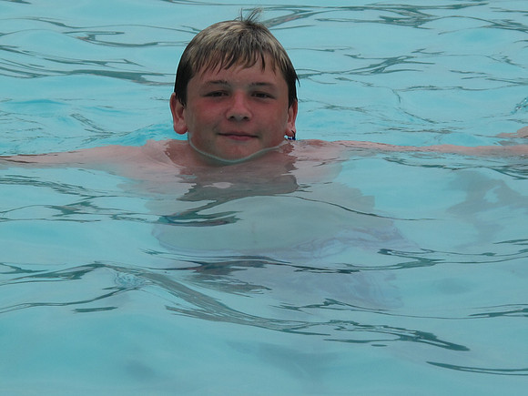 Ashley and Kelsi's friend, Justin.