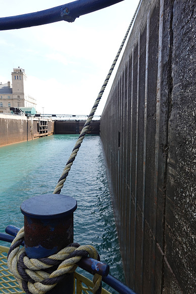It takes 20 minutes to fill the McArthur lock with 10 million gallons of water.  Passing through the locks, costs nothing.  The Soo Locks are only for motorized boats.