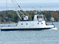 We will see this tugboat again later loading supplies on an ore freighter.
