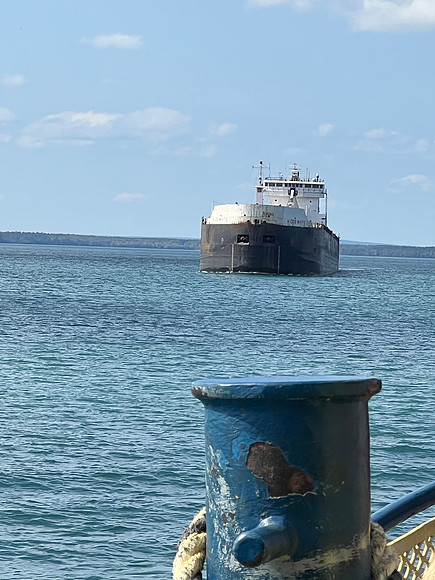 We met the H. Lee White ship who had just dropped off limestone.