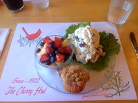 Terri ordered her favorite meal: chicken salad with dried cherries, fresh fruit and a cherry muffin.