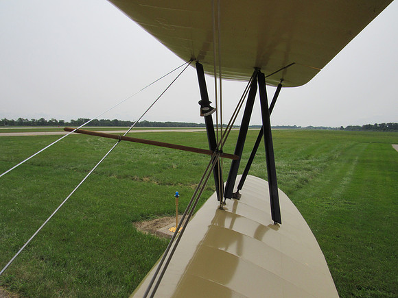 The plane takes off at 35 mph.  Top speed was around 65 mph.  It went up about 900'.
