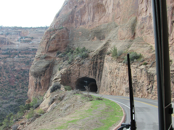 It doesn't look big enough, but yet the bus just fits through the tunnel.