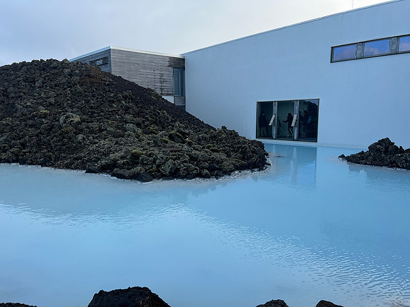 The water appears blue because of the silica and the way it reflects light.