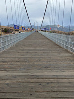 And now we start to walk the planks across the gorge.