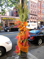 A group of people were out decorating the streets in beautiful fall arrangements like this.