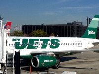 This is the plane that whisked us from Chicago to Boston.  Denny took the picture for our friends in New Jersey who are Jets fans.