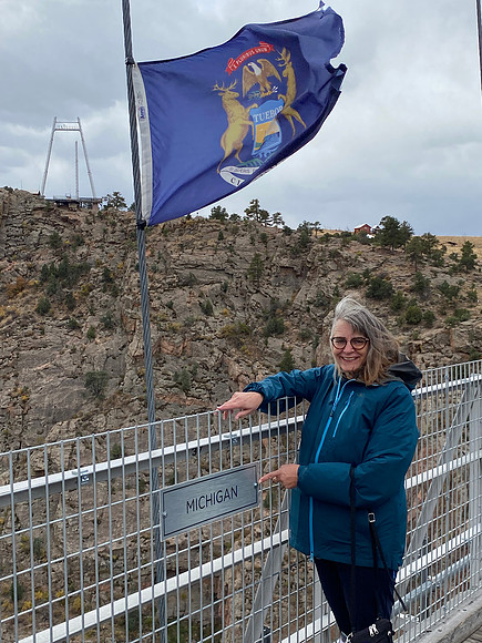 Each State is represented with a flag flying on the bridge.